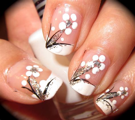 white nails with black flowers